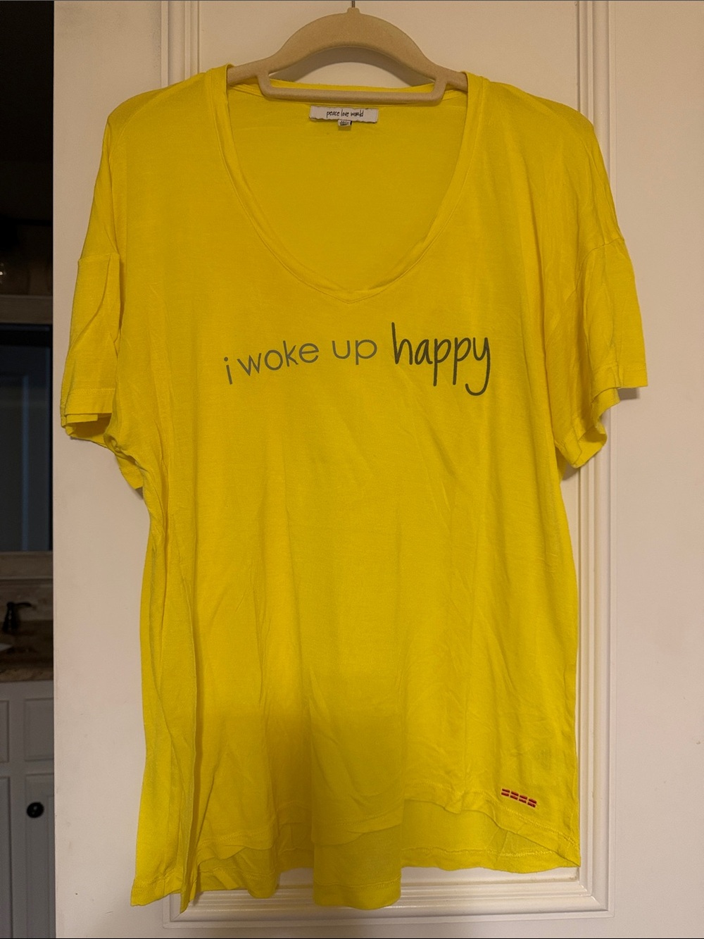Peace Love World Bright Yellow V-Neck Graphic Tee